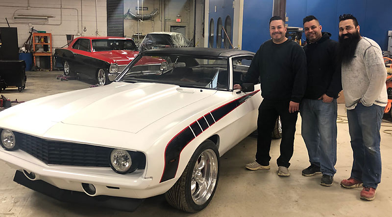 The Ruiz brothers (left to right): Robbie and Ziggy of Ruiz Landscaping and Joey Ruiz of Hot Rides Auto Body in Northbrook. The car is a '69 Camaro with an LS2 engine featuring a blower and fuel injection.